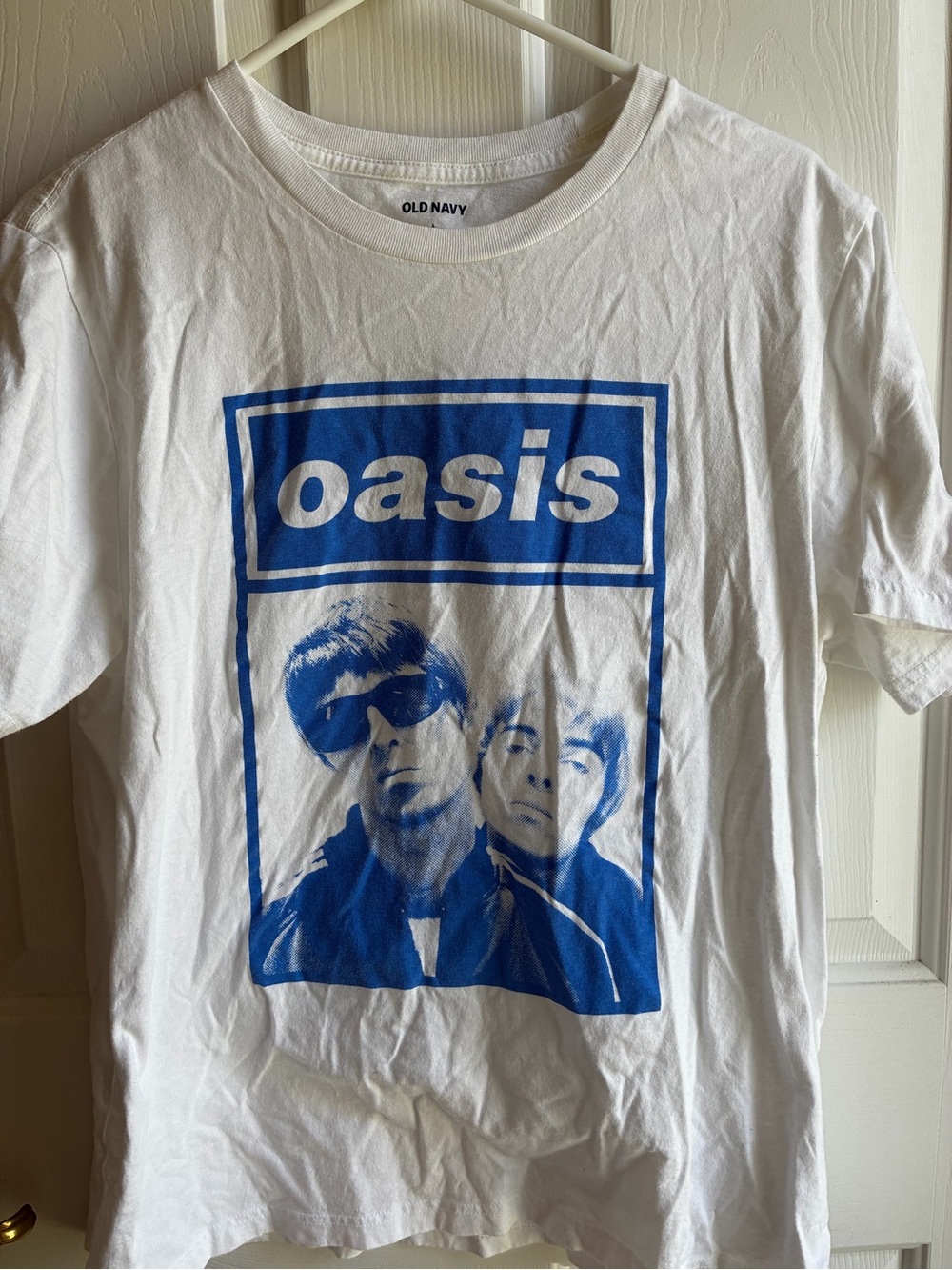 Oasis White T-Shirt with Bold Blue Band Graphic